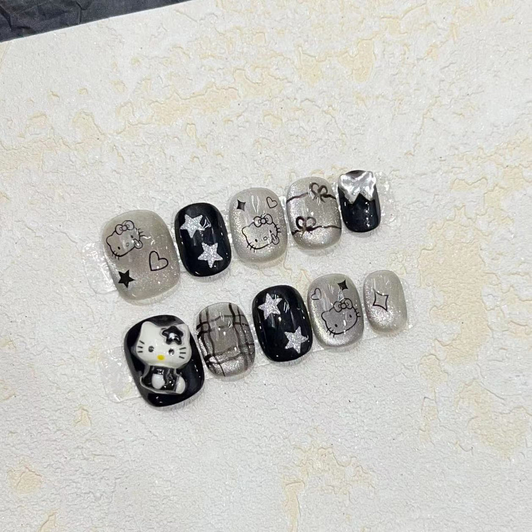 Fun and Whimsical Press-On Nail Set with Cartoon Accents Bowlift