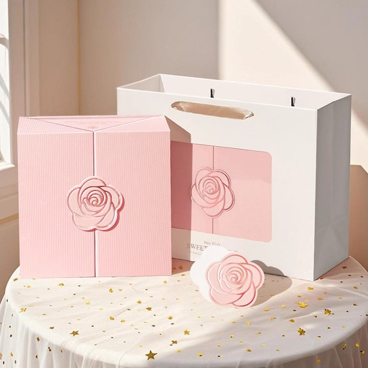 Luxurious rose-emblem gift box set with matching carry bag and magnetic closure Bowlift