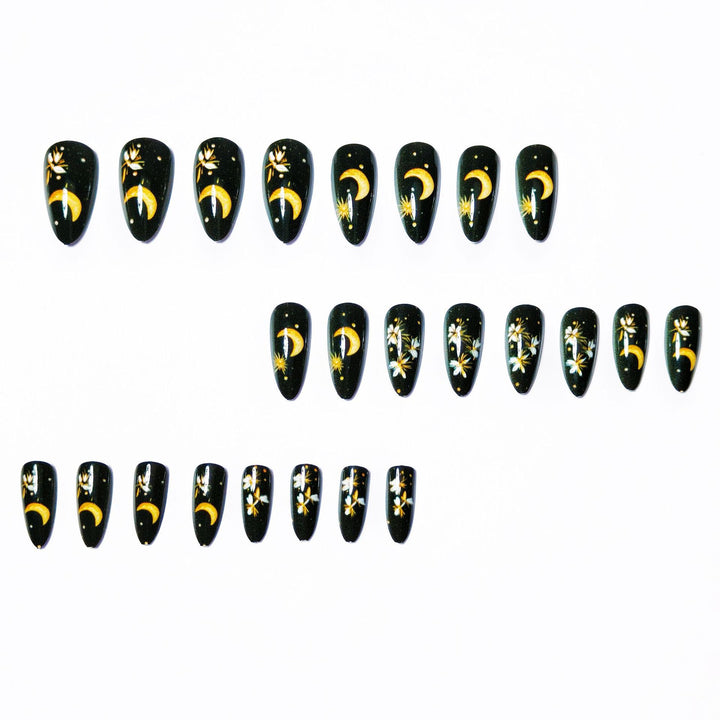 Glamorous artificial nails with moon and flower motifs Bowlift