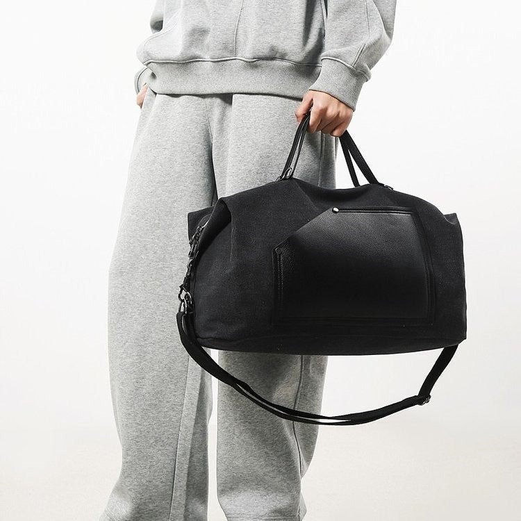 Sporty travel bag made of durable material with practical compartments Bowlift