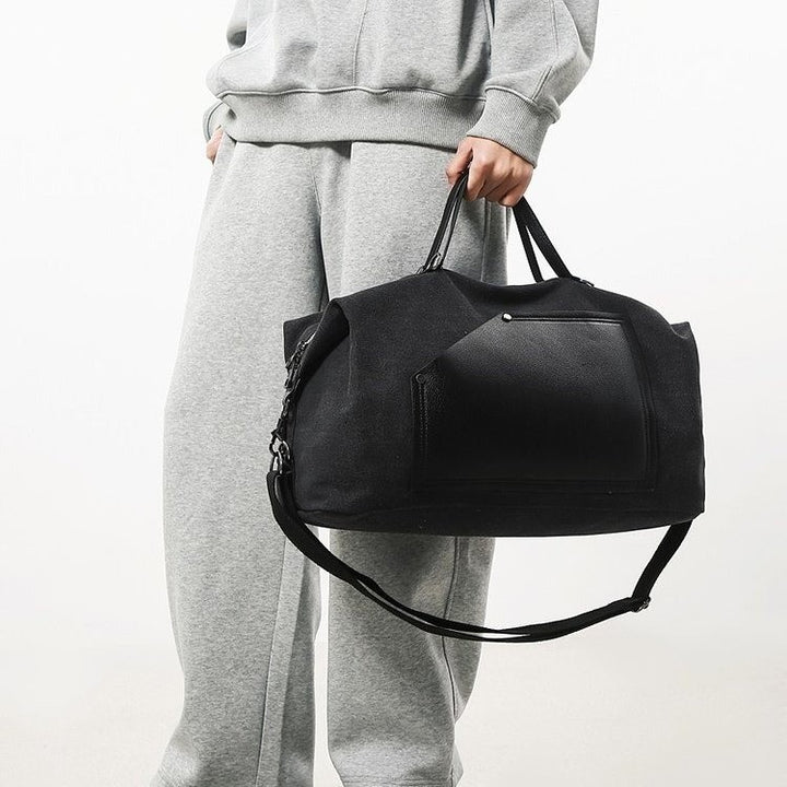 Sporty travel bag made of durable material with practical compartments Bowlift