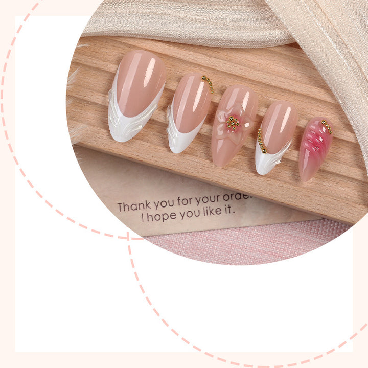 Acrylic nail set with floral design and elegant embellishments Bowlift
