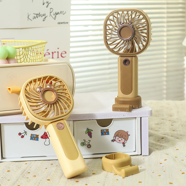 Women's portable mini hand fan with USB charging function and flexibly adjustable tilt angle Bowlift