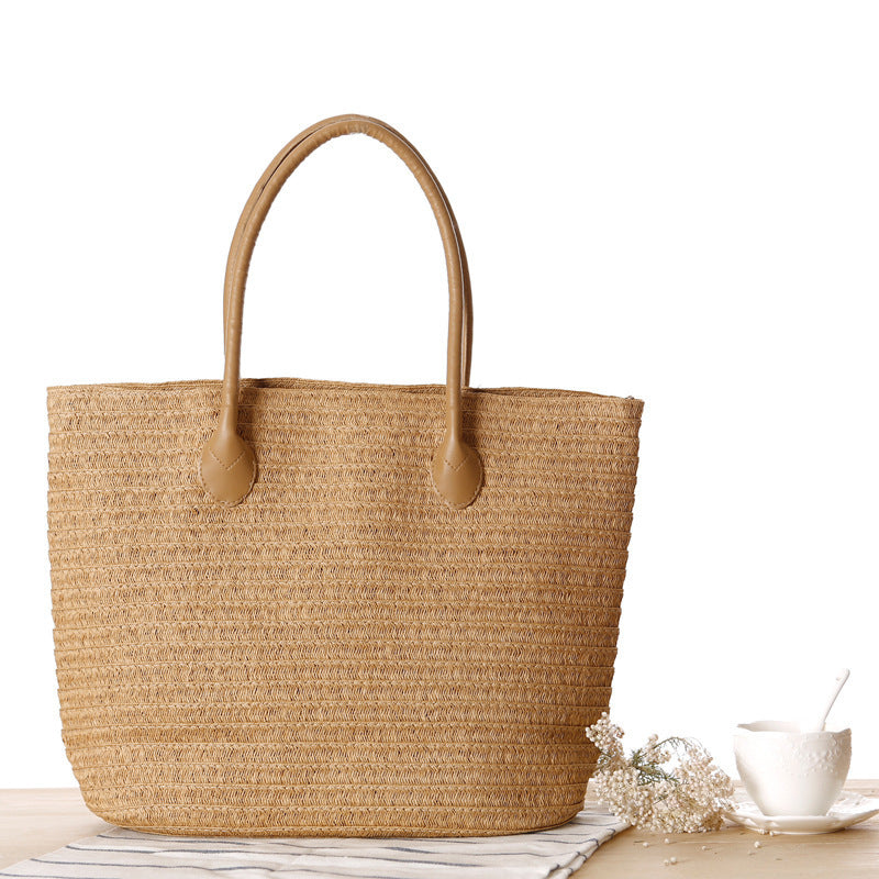 Spacious straw shopper with leather carrying handles Bowlift