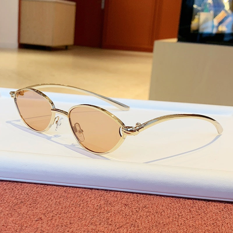 Women's designer sunglasses with elegant metal frame and protective lenses Bowlift
