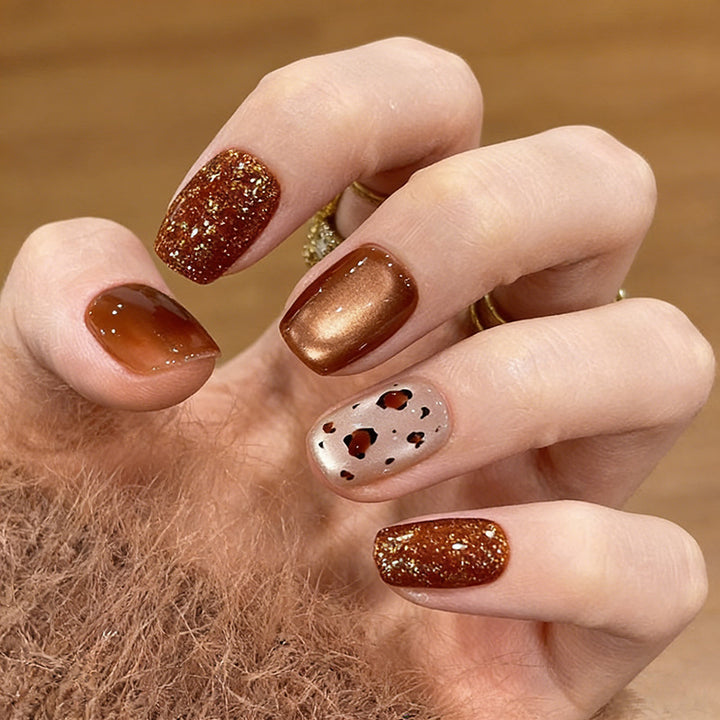 Artistic Press-On Nail Set with Glittery and Spotty Finish Bowlift