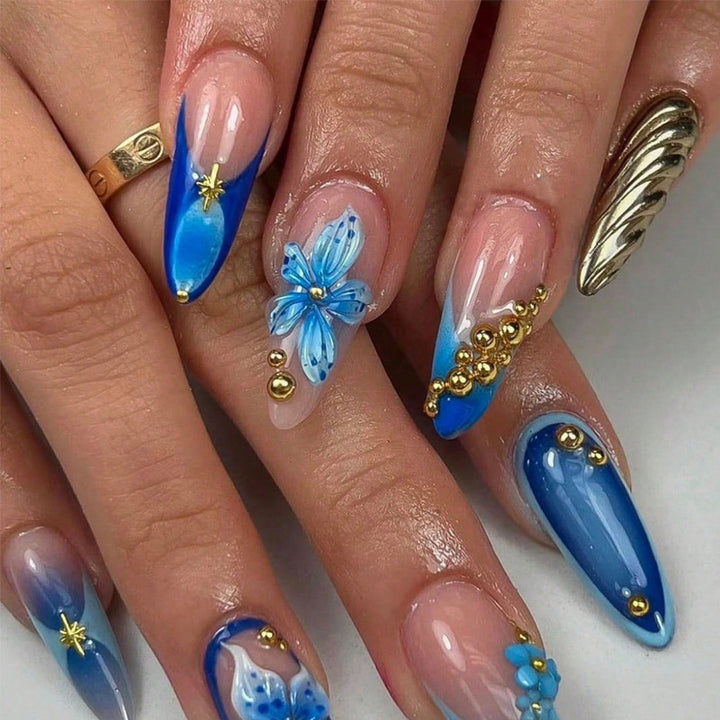 Artistic Press-On Nails with Floral and Metallic Accents Bowlift