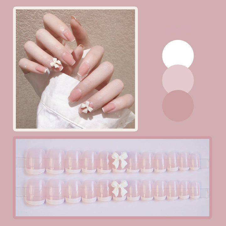 Artificial nails with elegant bow motifs Bowlift