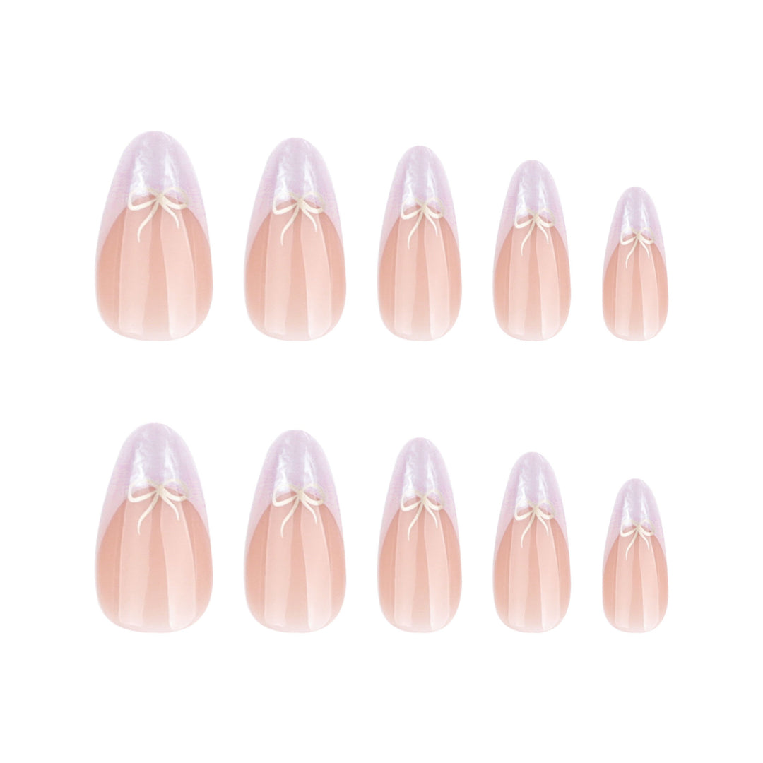 Artful stiletto nails with elegant design and radiant accents Bowlift