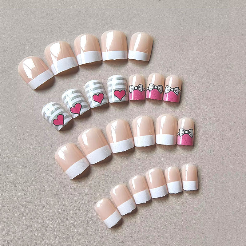 Artificial nails with playful heart and bow pattern Bowlift