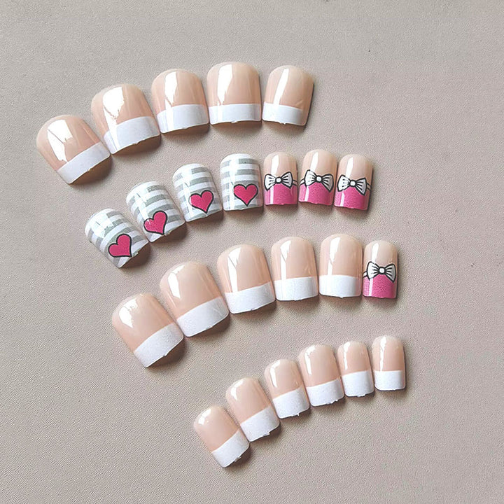 Artificial nails with playful heart and bow pattern Bowlift