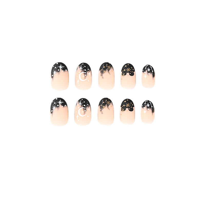 Artistic nail art with moon and star motifs Bowlift