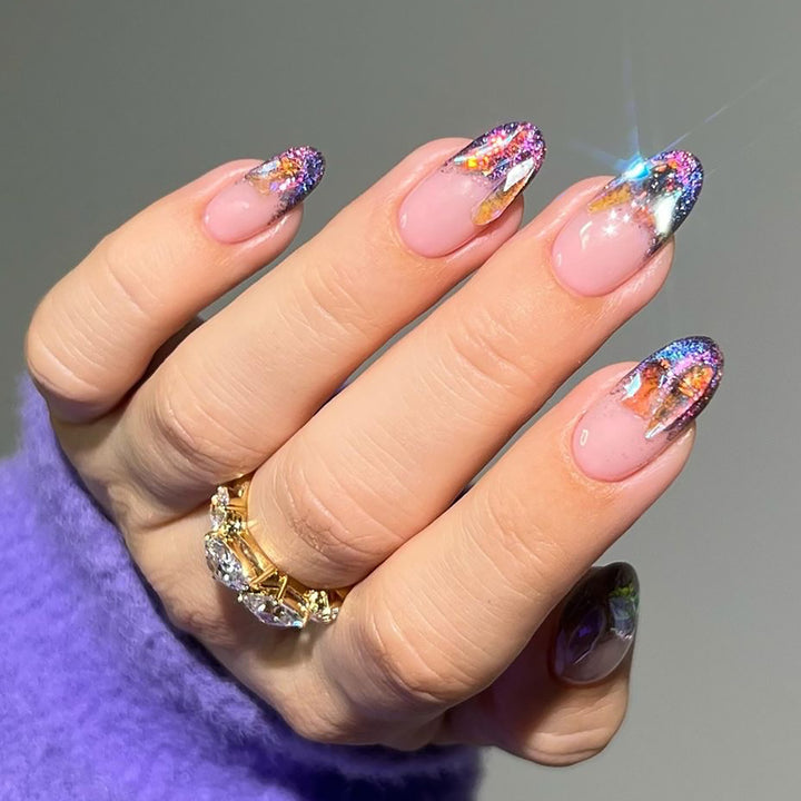 Artistic Gel Nails with Glitter and Rhinestone Accents Bowlift