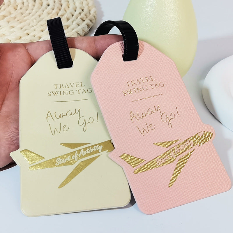 premium travel luggage tag with embossed airplane motif Bowlift