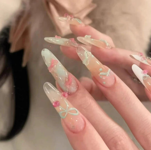 Artistic Long Stiletto Press-On Nails with Floral Accents Bowlift