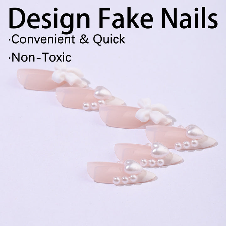 Artificial nail set with elegant pearl and bow decorations Bowlift
