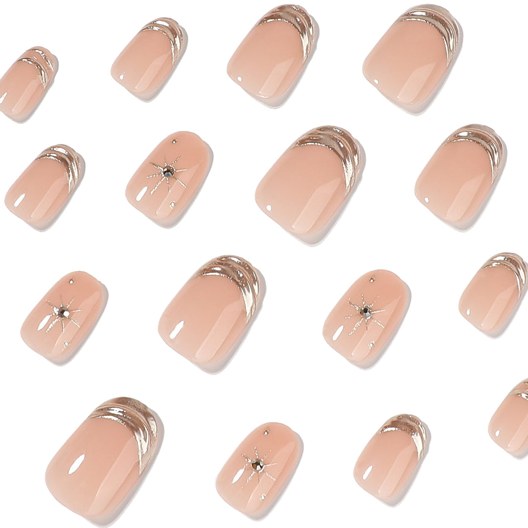 Glamorous nail extensions with elegant metallic accents Bowlift