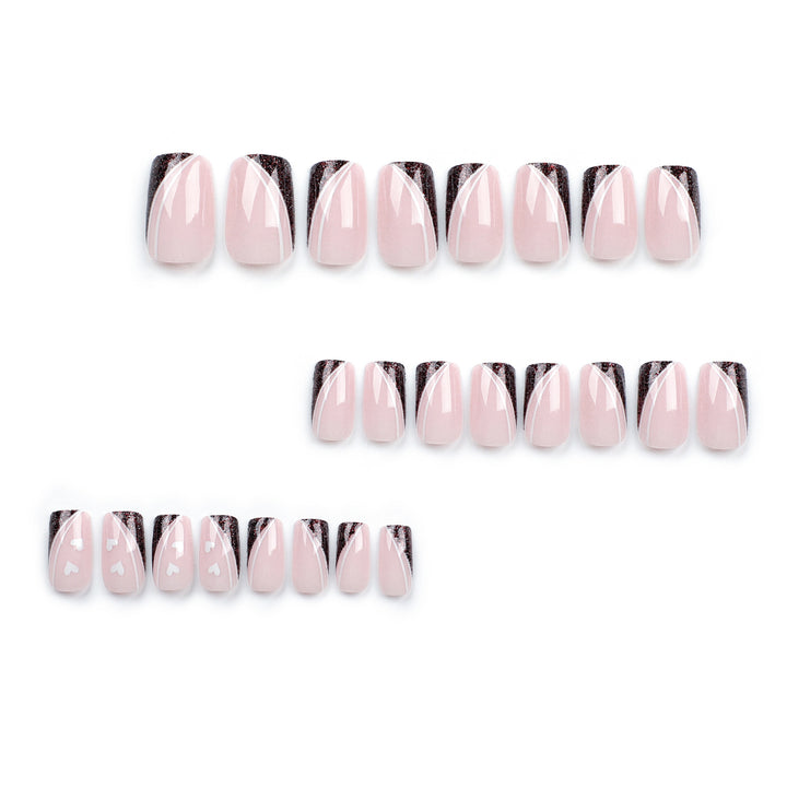 Artistic Nail Art with Elegant Glitter and Heart Design Bowlift