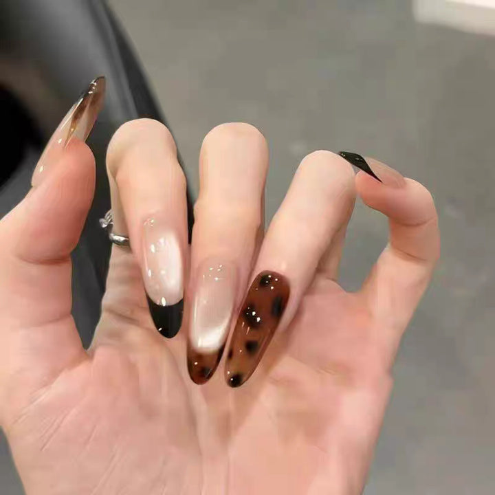 Artificial nails with elegant ombre design and delicate accents Bowlift