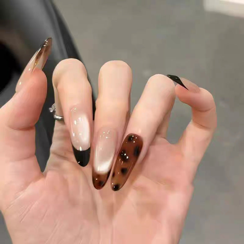 Artificial nails with elegant ombre effect and delicate rhinestone embellishments Bowlift