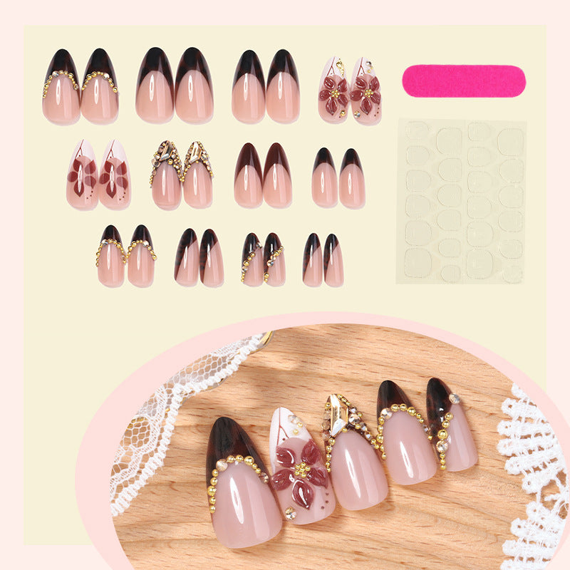Acrylic nail set with elegant flower and glitter accent Bowlift