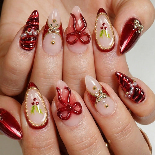 Artificial nail set with glamorous decorations and festive accents Bowlift