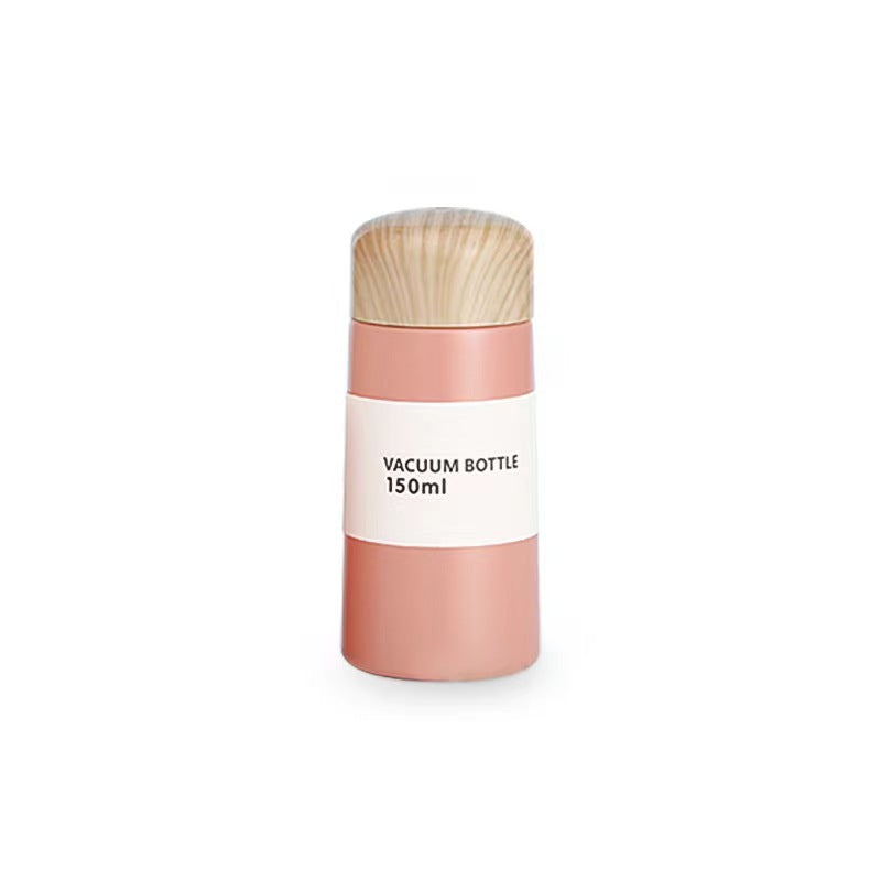Women vacuum-insulated water bottle with innovative wooden lid Bowlift