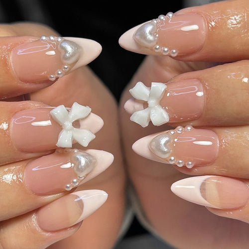 Artificial nail set with elegant pearl and bow decorations Bowlift