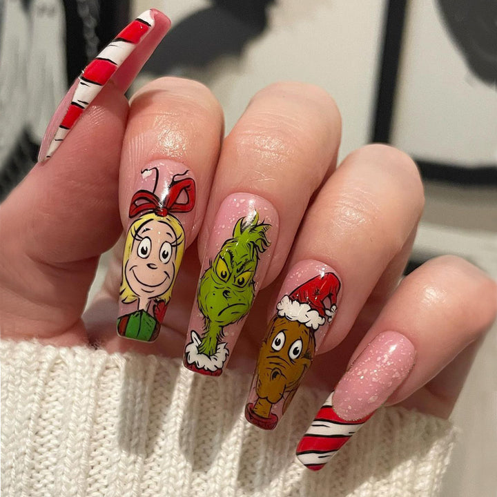 Artificial nail set with festive motifs and charming Grinch design Bowlift