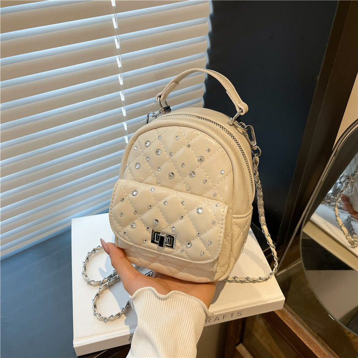 Quilted Mini Backpack with Rhinestone Accents Bowlift