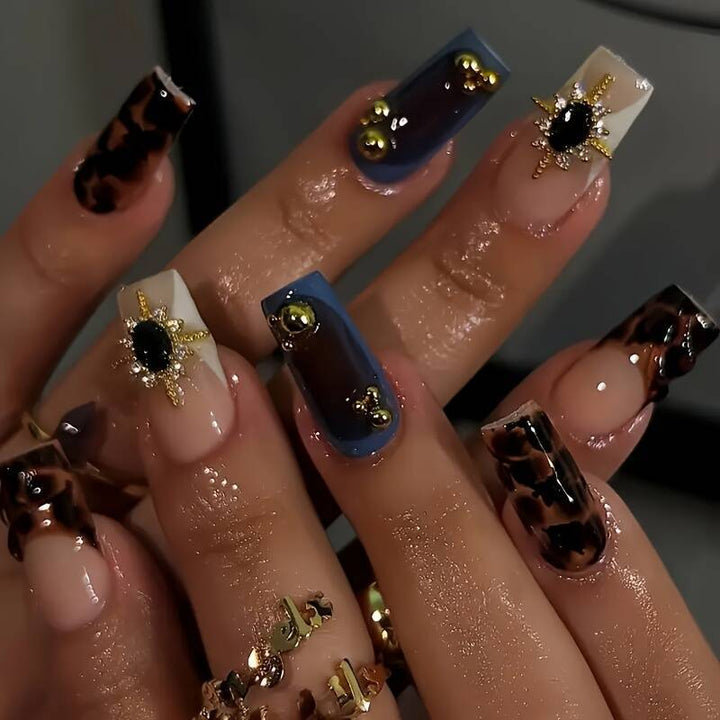 Artistic Patterned Press-On Nail Set with Decorative Elements Bowlift