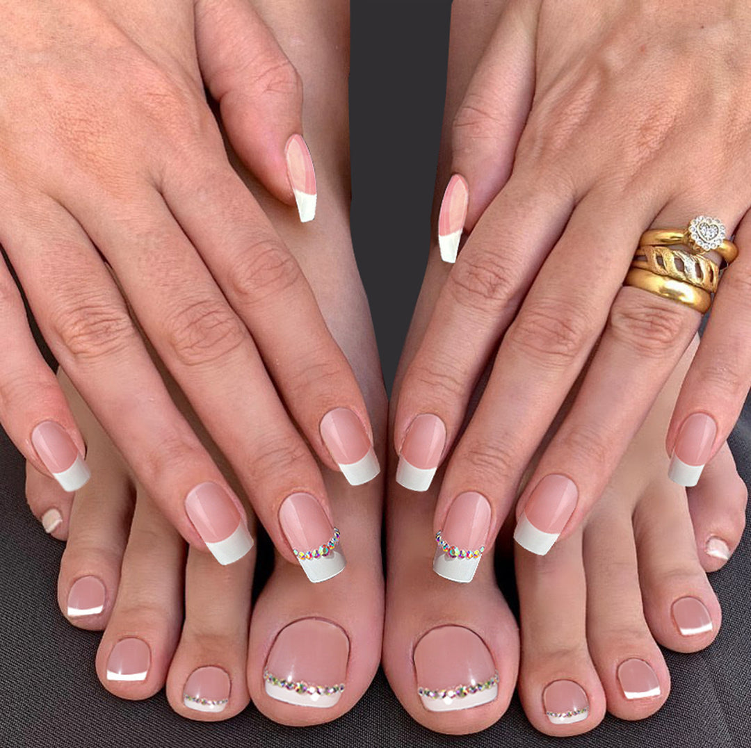 Acrylic nail set with elegant French design and rhinestone embellishments Bowlift