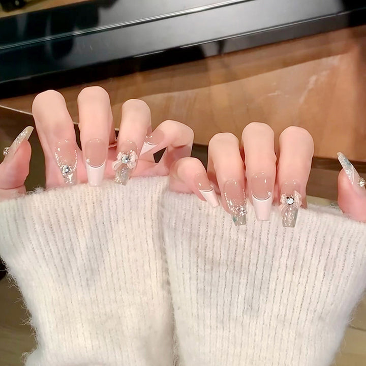 Glamorous artificial nails with glitter design Bowlift