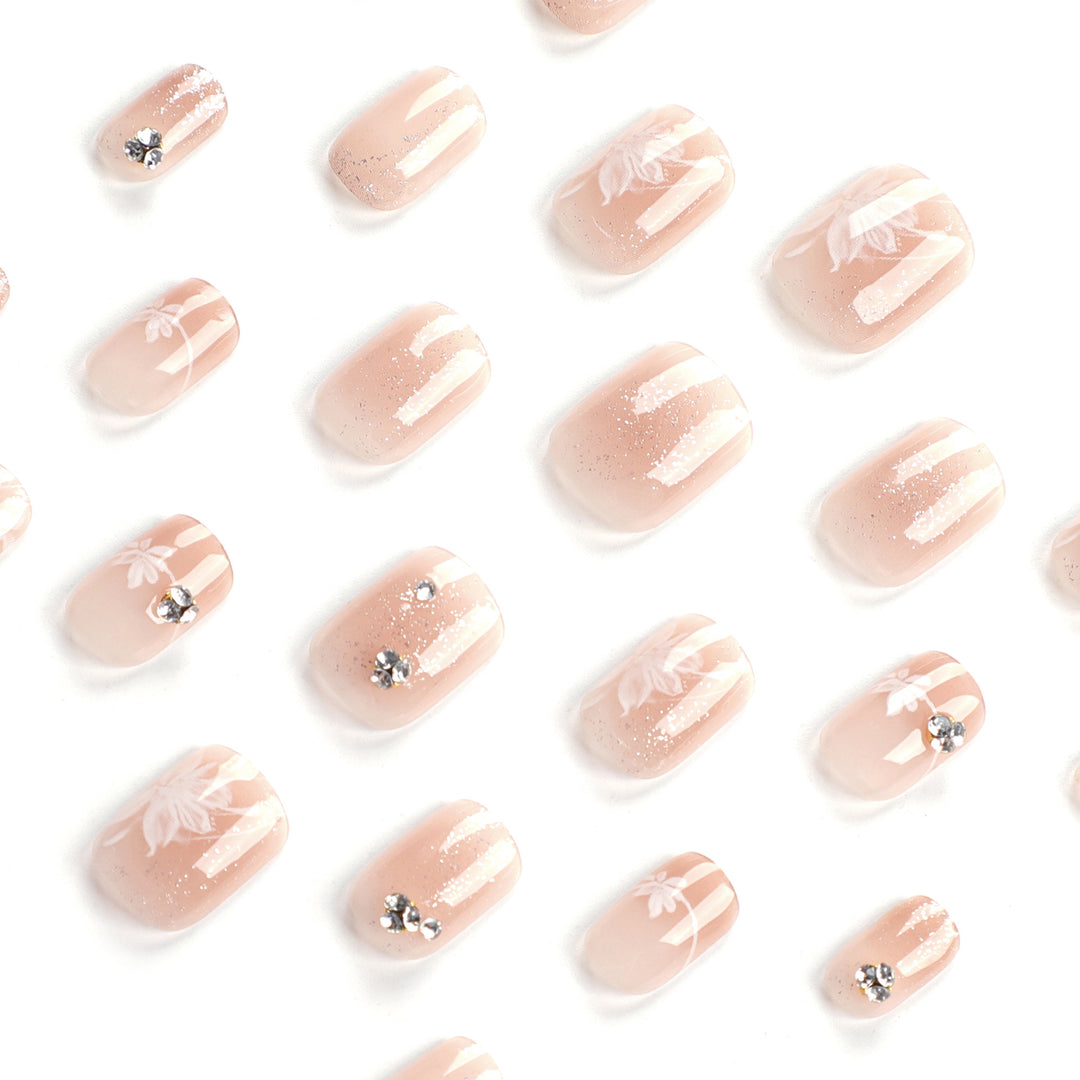 Elegant Nail Art with Holographic Accents and Floral Embellishments Bowlift