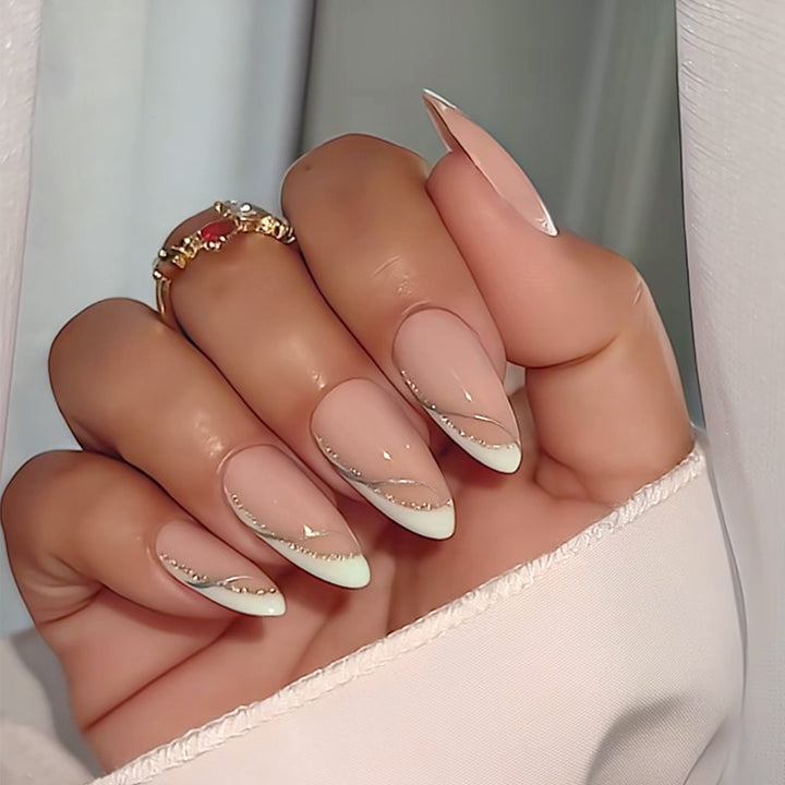 Elegant French Tip Press-On Nails with Glitter Accents Bowlift