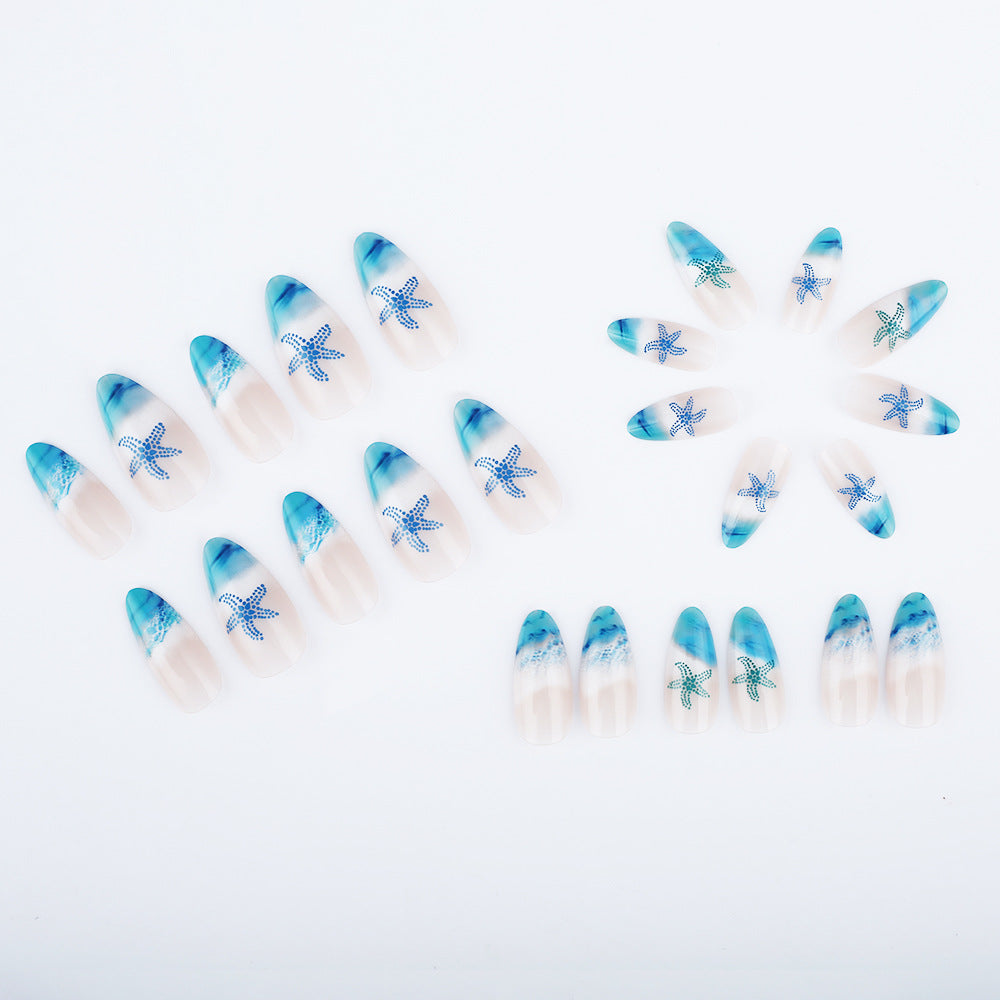 Artistic Press-On Nail Set with Ocean-Inspired Design Bowlift