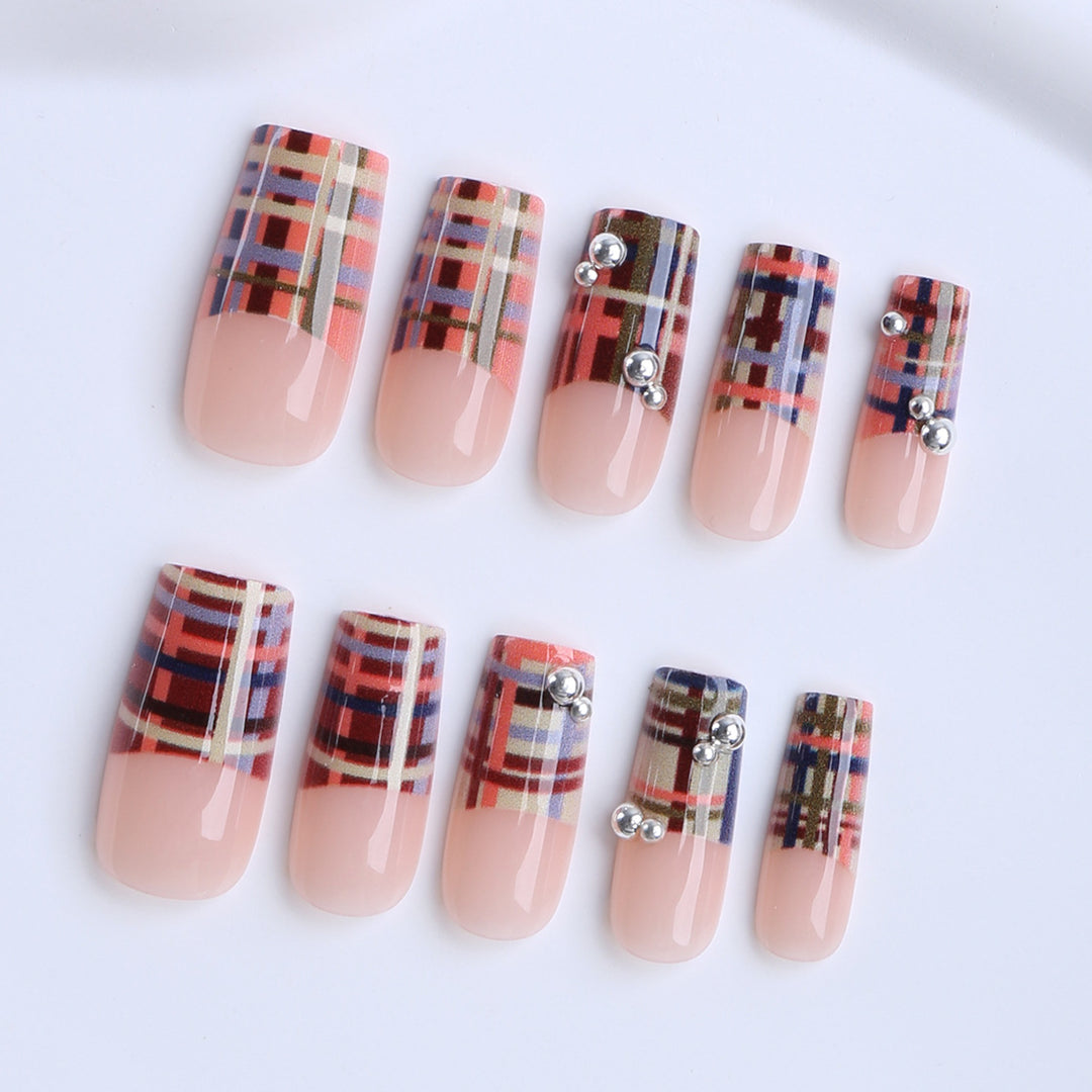 Artificial nails with geometric patterns and glossy accents Bowlift