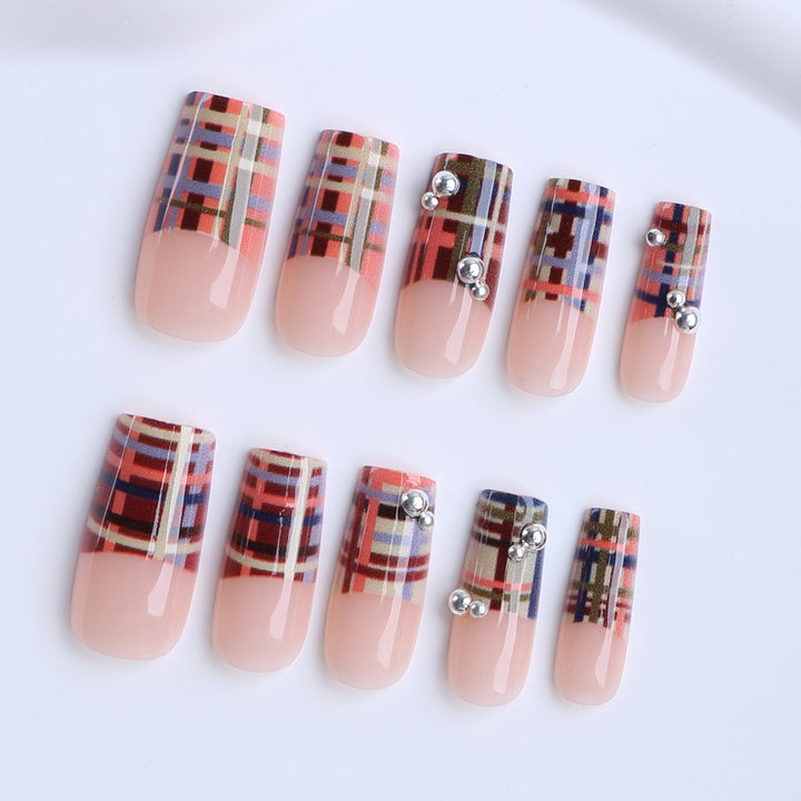 Artificial nails with geometric patterns and glossy accents Bowlift