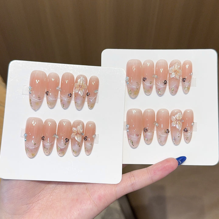 Artificial nails with delicate flower and glitter detail Bowlift