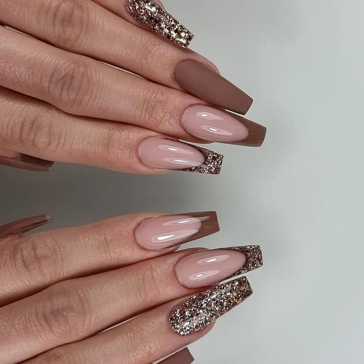 Artful stiletto nails with glitter embellishments Bowlift