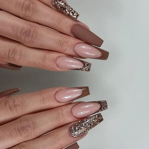 Artful stiletto nails with glitter embellishments Bowlift