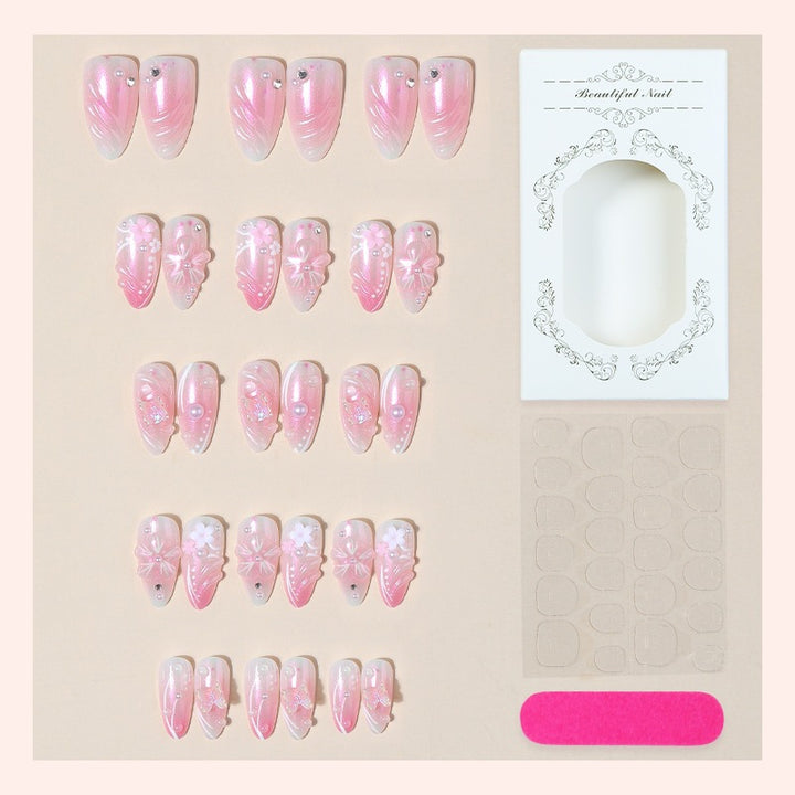 Acrylic nail set with elegant flower design and glitter accents Bowlift