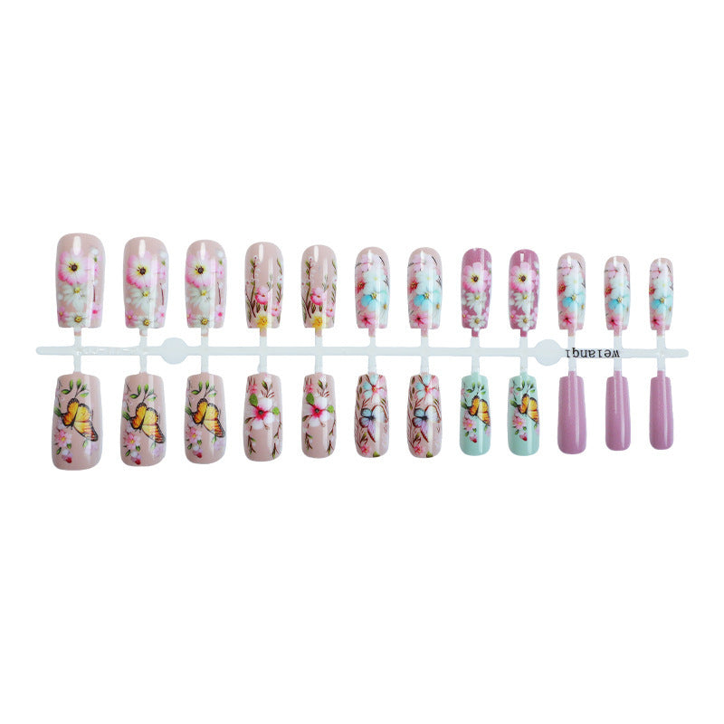 Artificial nail set with floral motifs and butterfly design Bowlift