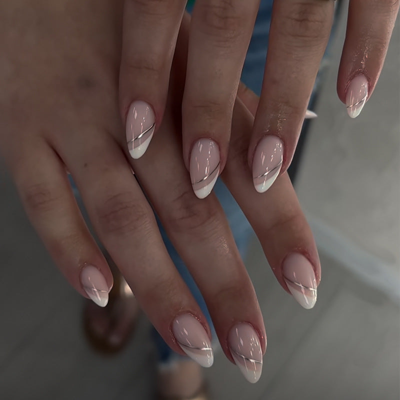 Elegant Stiletto Press-On Nail Art with Rhinestone Accents Bowlift