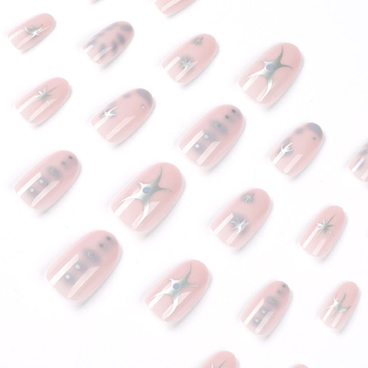 Elegant nail art with glamorous metal embellishments Bowlift
