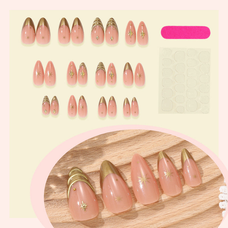 Artificial nail set with elegant golden accents and sparkling stars Bowlift
