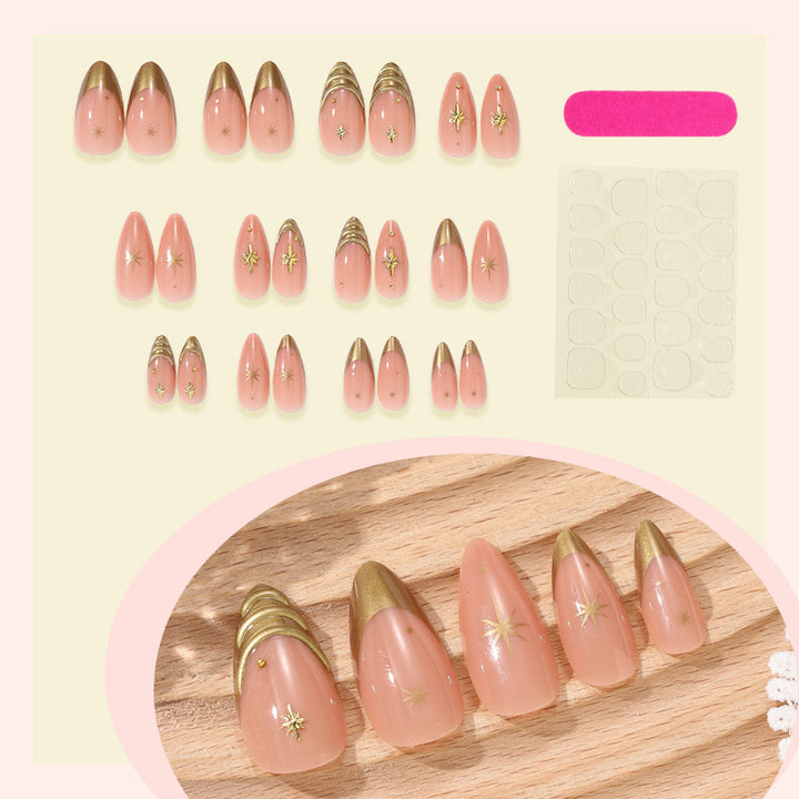 Artificial nail set with elegant golden accents and sparkling stars Bowlift