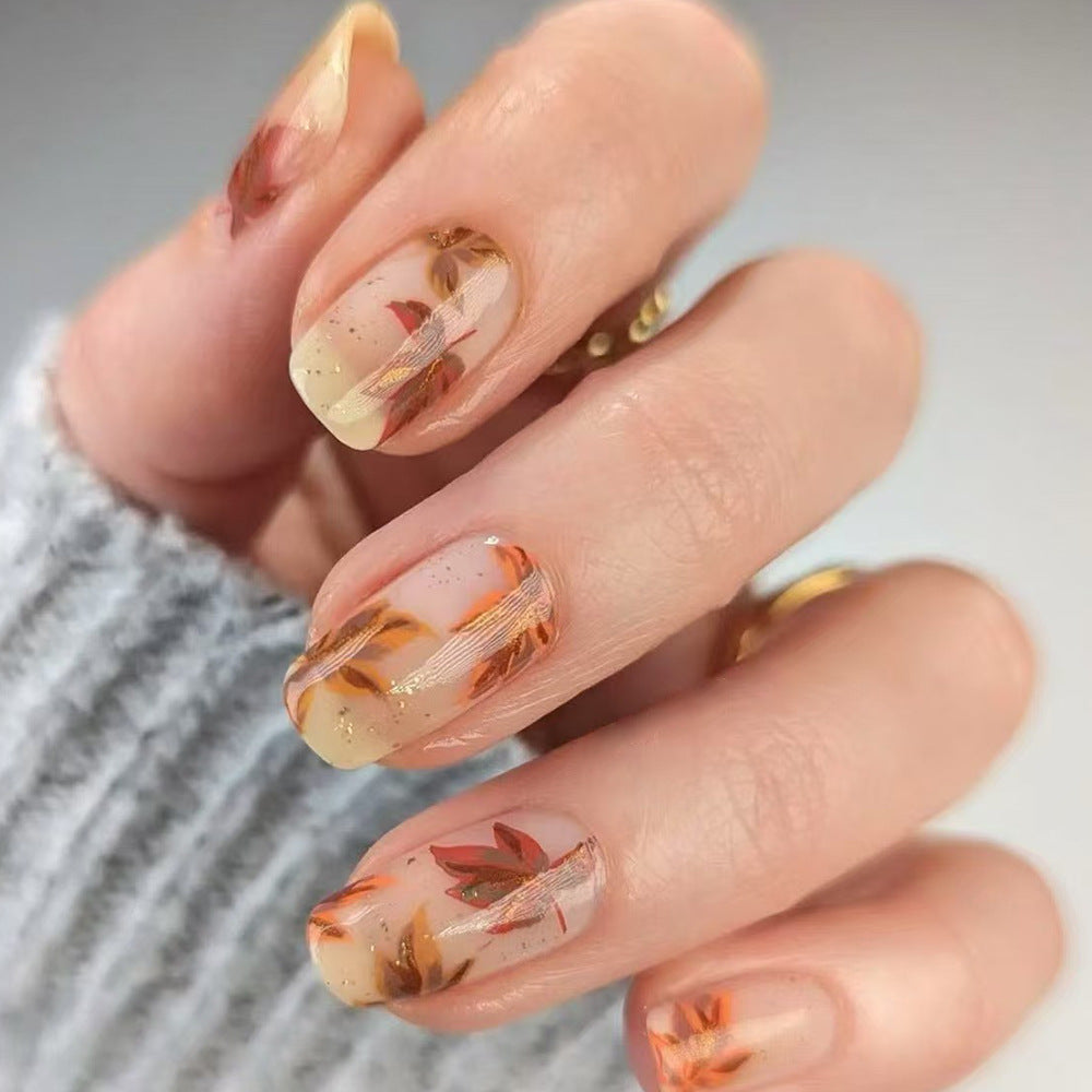 Artistic Press-On Nail Set with Floral Accents Bowlift