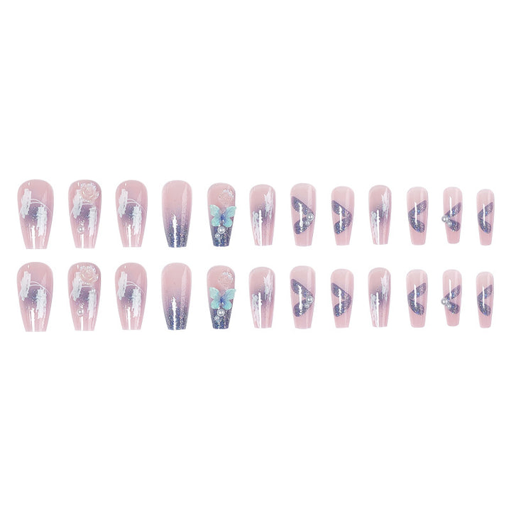 Artistic 3D nail extensions with glitter accents Bowlift