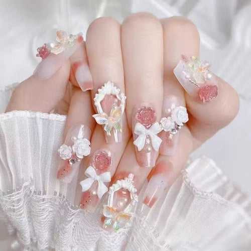 Artistic nail set with 3D flower and bow details Bowlift